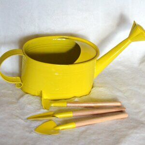 Pastel Yellow Watering Can With Tools
